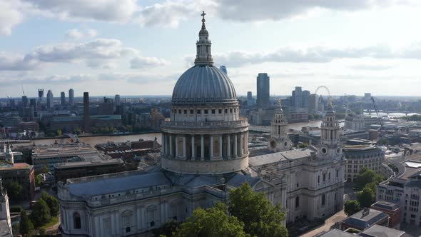 Slide and Pan Footage of Saint Pauls Cathedral Against Bright Clouds in Sky