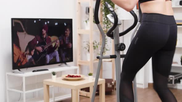 Athletic Caucasian Young Woman Working Out at Home