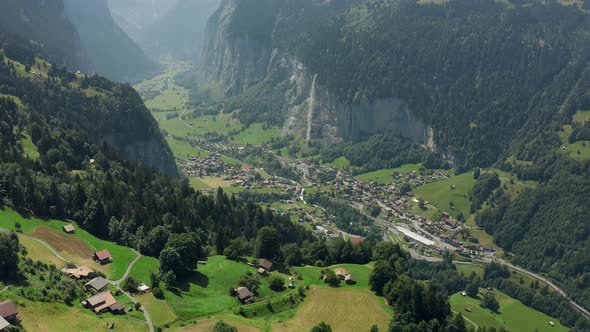 Amazing Aerial of Lauterbrunnen valley with waterfalls and swiss alps