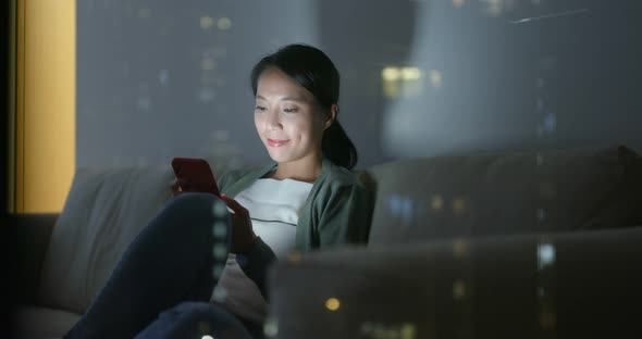 Woman Use of Mobile Phone at Night