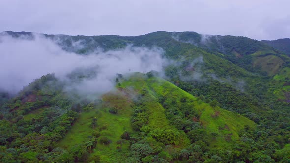 Picturesque View Of Mountain Peaks Surrounded By Clouds At Los Mogotes Villa Altagracia In Dominican