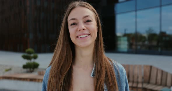 Portrait of Happy Girl Looking to Camera