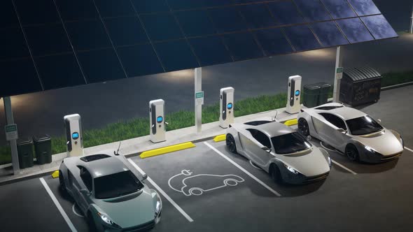 Electric cars connected to the charging station. Vehicles using renewable energy