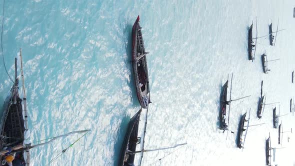 Vertical Video Boats in the Ocean Near the Coast of Zanzibar Tanzania Aerial View