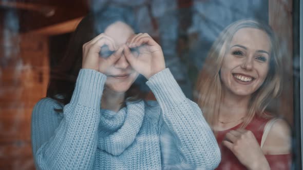 Young Girls Friends Enjoying Winter Vacation