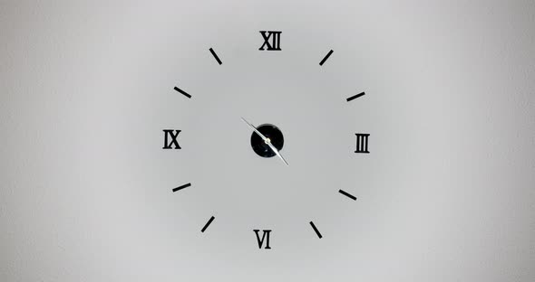 Clock on White Background and Movement of Clock Hands. Time Lapse Clock with Three Arrow Hands