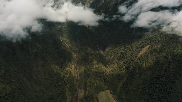 Picturesque View Mountainous Landscape Surrounded On Tungurahua Volcano In Ecuador. Aerial Tilt-up