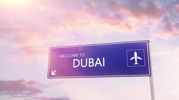 Dubai City Sign Plane Landing in Daylight