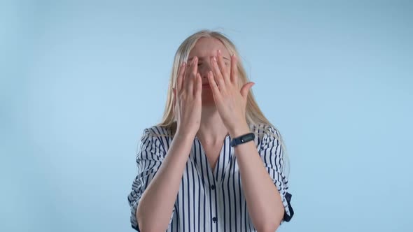 Desperate and Angry Woman Spreading Her Hands To the Sides and Crying.