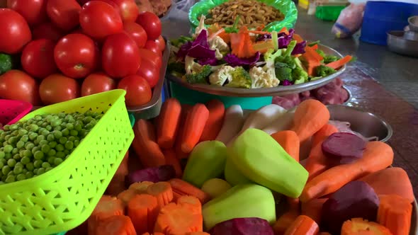 Wide variety of fresh vegetables such as carrot, chayote, tomatoes and many more on display for sale