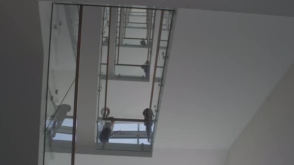 Busy Staircase in Multi-Story Office Building