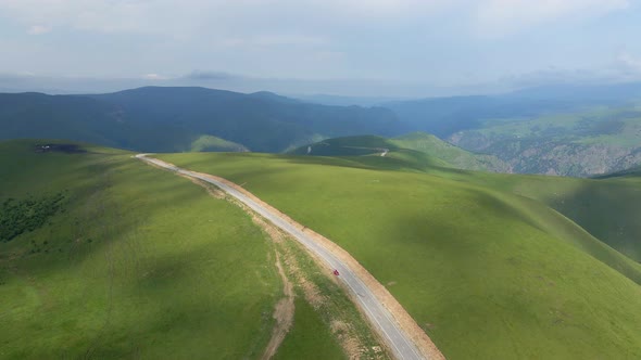 View of the Green Caucasus Mountains in Summer From the Sky