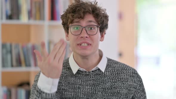 Portrait of Angry Young Man Arguing, Fighting