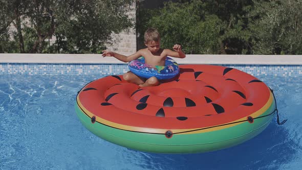 Boy Having Fun in Pool