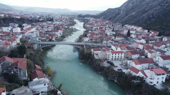 Aerial Drone View Of City Of Old Bridge And Neretva River In Mostar 4K