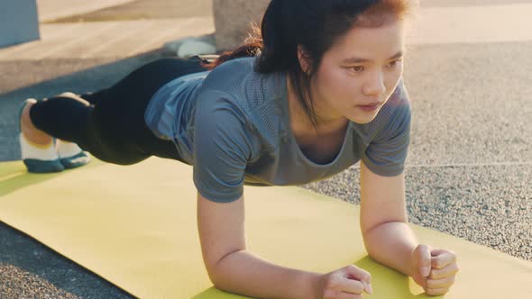 Beautiful Asian young fitness working out exercise.