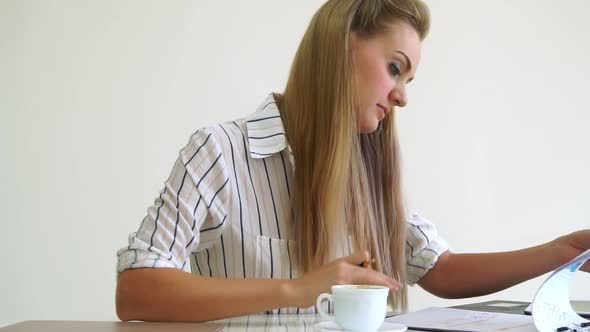 Blonde Business Woman Working at Modern Office