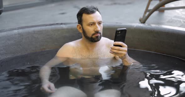 Man Relaxing at Spa Outdoors