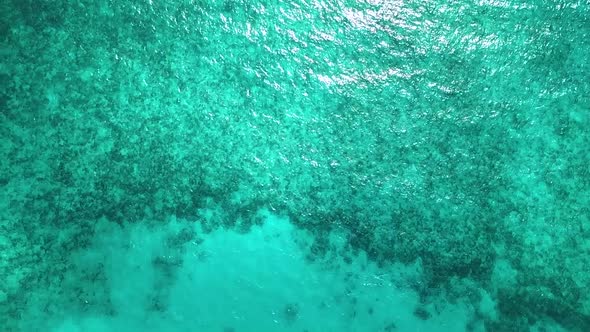 A aerial view of Florida's Coral Reef. The third largest barrier reef in the world. Pictured is a po