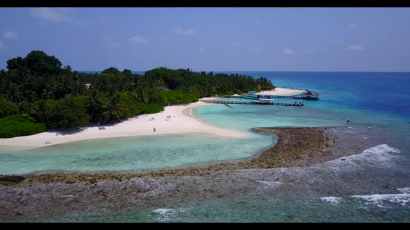 Aerial flying over scenery of exotic resort beach lifestyle by shallow lagoon and clean sand backgro