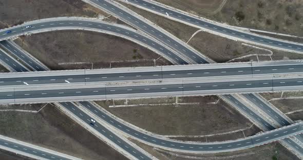 Aerial view of highway and overpass. Road junction, highway intersection top view.