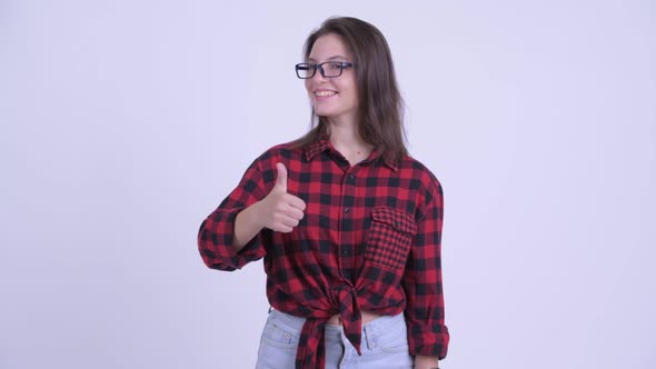 Happy Young Beautiful Hipster Woman Giving Thumbs Up