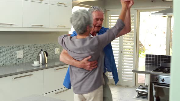 Happy couple dancing together