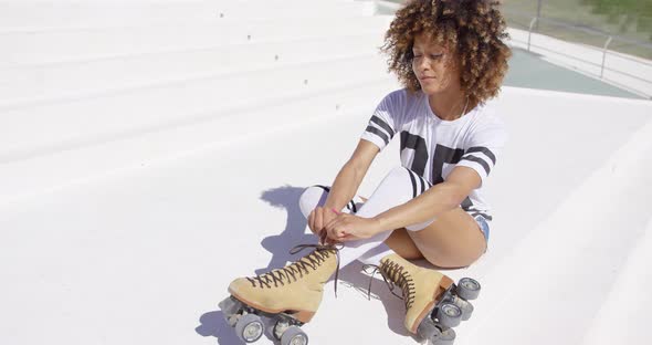 Female Wearing Roller Skates Posing