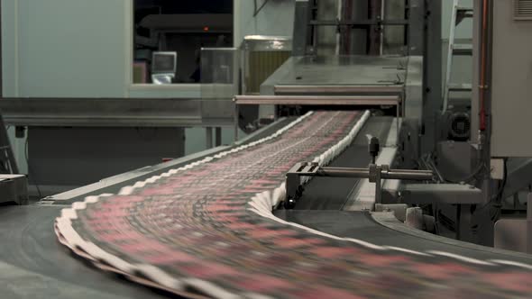 Newspaper production and printing process at high speed in printing factory
