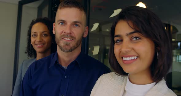 Business colleagues smiling in office 4k