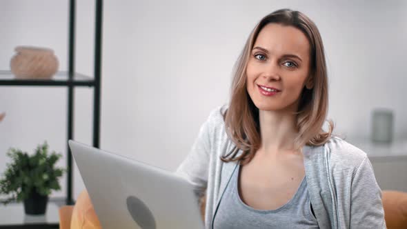 Portrait Smiling Freelancer Woman Posing with Laptop