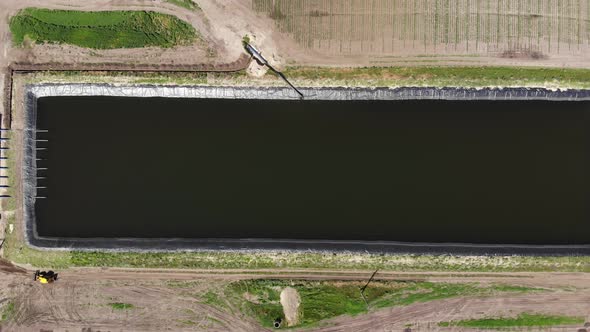 Aero. Top View. Man-made Special, Water Storage Pool, Tank or Reservoir for Agricultural Fields