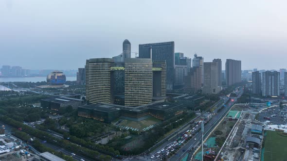 Timelapse of busy traffic road with modern office building in hangzhou china