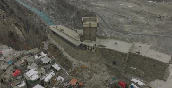 Aerial Over Altit Fort In Hunza Valley. Dolly Back, Tilt Up