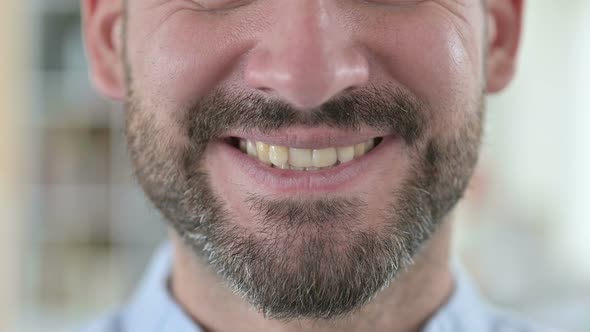 Close Up of Mouth of Smiling Young Man 