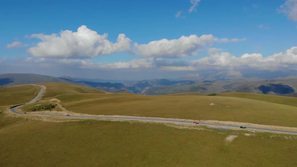 Aerial View of the Road Passing By the Caucasus Mountain Range Elbrus Region