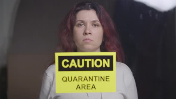 Sad Woman in Quarantine Ward. Coronovirus and Isolation Concept