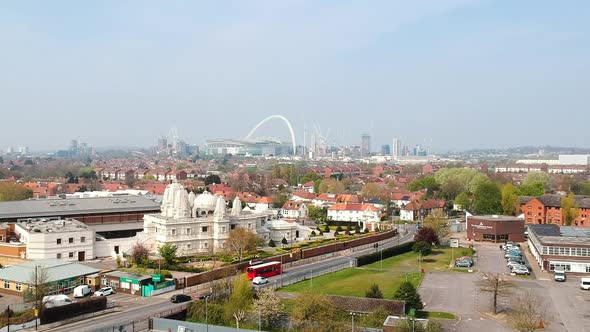 BAPS Shri Swaminarayan Mandir Hindu Temple in Neasden, London with Wembley Stadium. Drone Footage.