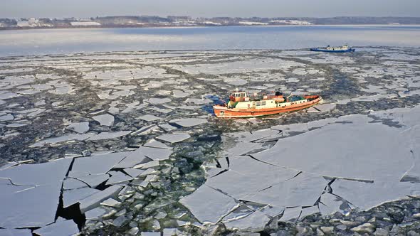 Icebreakers on Vistula River crushing ice, Plock, 2020-02-18, Poland