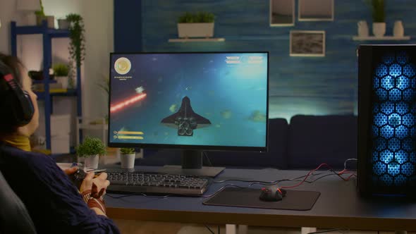 Pro Gamer Playing Space Shooter Online Championship