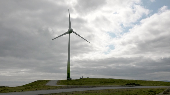 Environment friendly concept. Electrical windmill or wind turbine with rotating blades. Denmark.