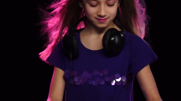 Teen Girl Dj in Headphones Plays for Turntable. Slow Motion