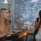 Pretty Girls Singing a Song While One of Them Playing the Keyboard During Rehearsal at Home - VideoHive Item for Sale
