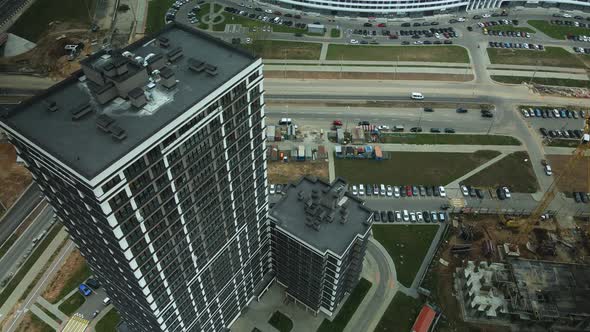 Construction of modern multi-storey buildings. Construction of a new city block.