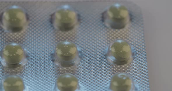 Prescription drugs - Capsules, pills, tablets on reflective background