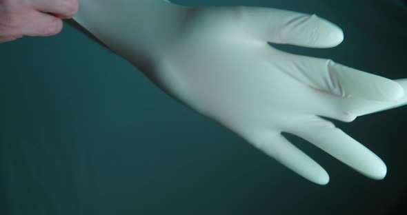 Gloves wearing man slow motion 4K