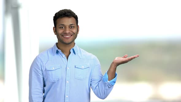 Handsome Businessman Showing Blank Copy Space.