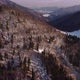 Aerial View of Mixed Winter Forest in Hilly Mountain Alpine Landscape - VideoHive Item for Sale