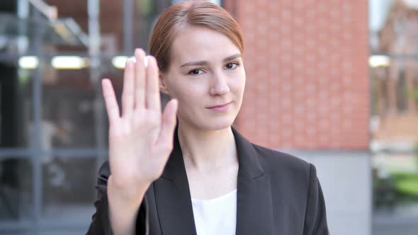 Stop Gesture by Young Businesswoman, Outdoor