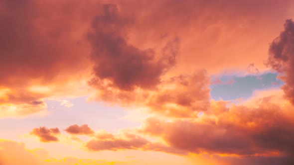 Sunset Cloudy Sky With Fluffy Clouds